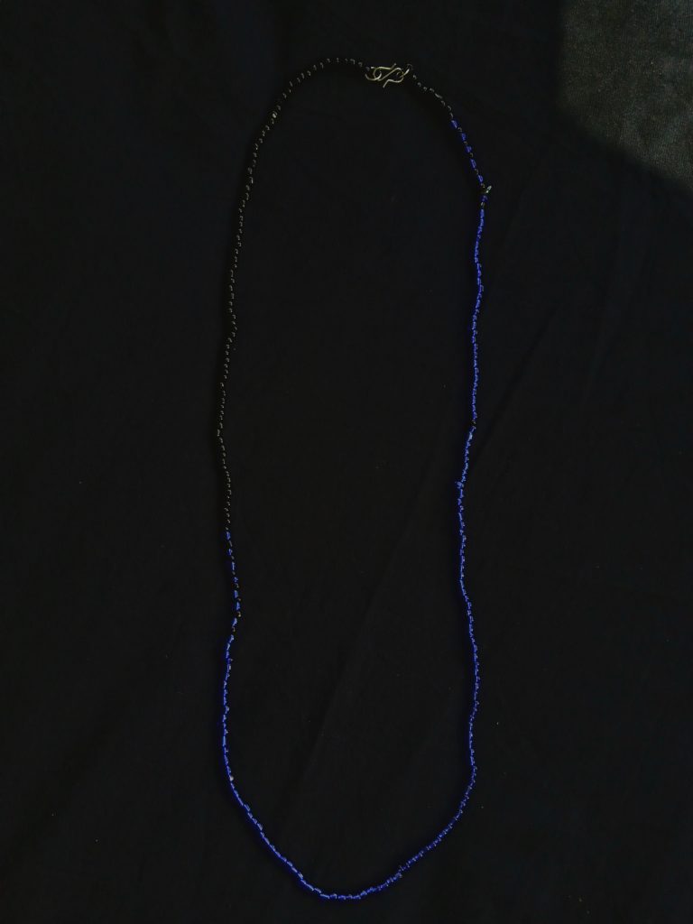 Handcrafted Oui Cherie Oui Blue Ink Seed Necklace